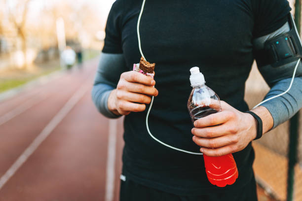 Protein bar and energy drink - close up