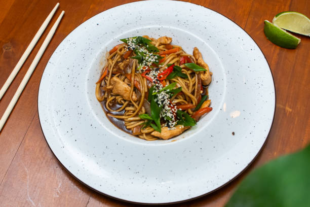istock Traditional asian noodles with chicken meat 1308571700