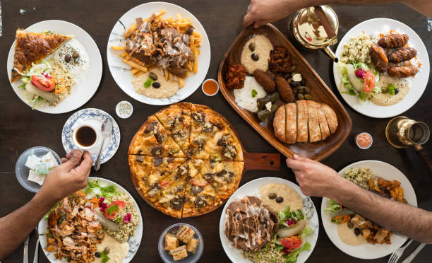 istock Turkish food with people hands on food. 1308576059