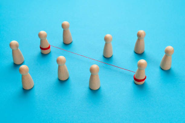 istock Communication between two persons. Figures of people on a blue background. Social contacts concept 1308577634