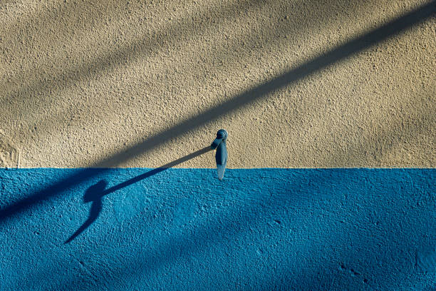 istock yellow and blue abstract background with shadows ,minimalist image . 1308579176