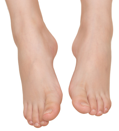 Child feet isolated on white background