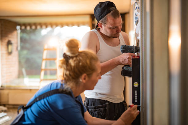 istock Busy construction workers working on home improvement in the apartment 1308583279