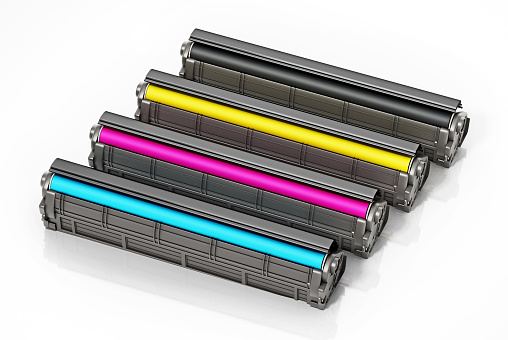 Set of spare laser printer toner cartridges. Cyan, magenta, yellow and black.