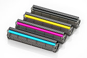 Set of spare laser printer toner cartridges. Cyan, magenta, yellow and black