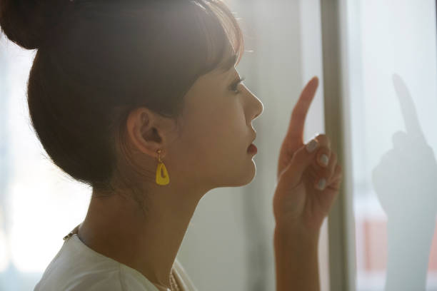istock A young Asian business woman thinks seriously 1308588566