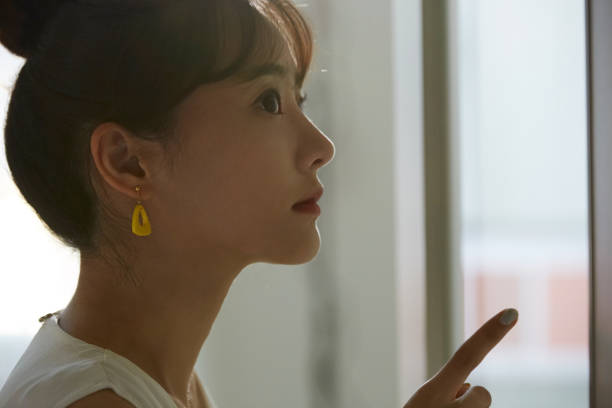 istock A young Asian business woman thinks seriously 1308588653