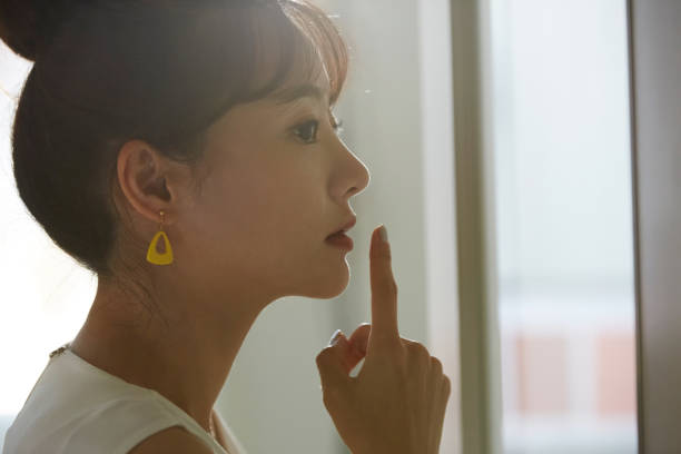 istock A young Asian business woman thinks seriously 1308588796