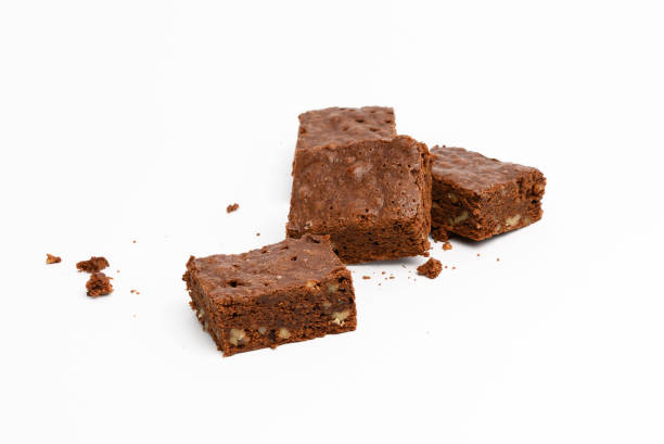 istock baked chocolate brownie pieces with walnut on white background 1308591378