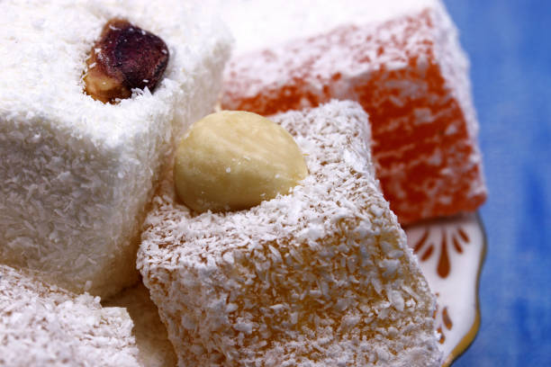 istock Turkish delight on blue wooden background 1308591864