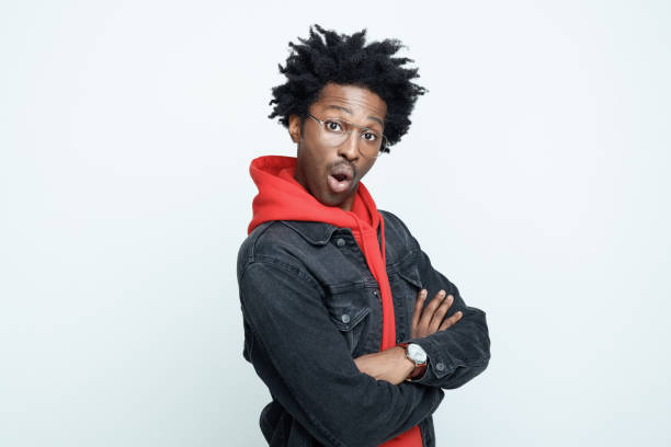 istock Surprised man in red hoodie 1308592490