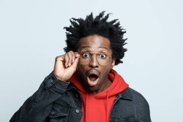istock Surprised man in red hoodie 1308592610