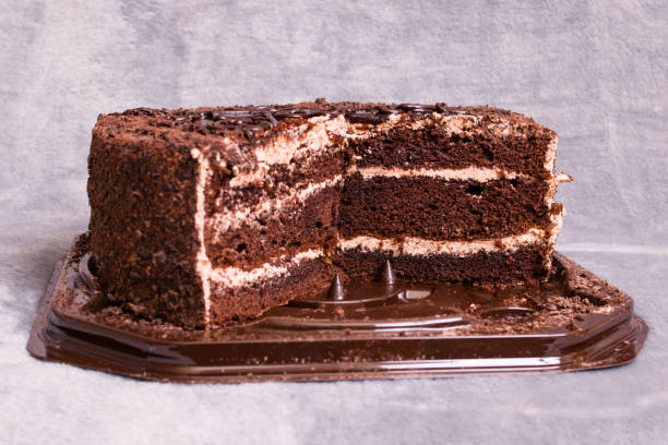 istock Chocolate cake on a gray background closeup 1308593036