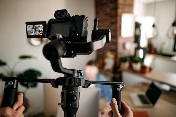Cameraman recording with his equipment