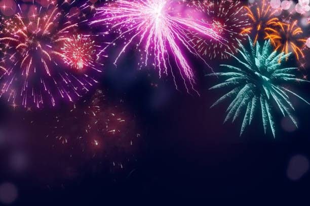 istock Holiday fireworks illustration; Abstract  colored fireworks background with copy space for text 1308594321