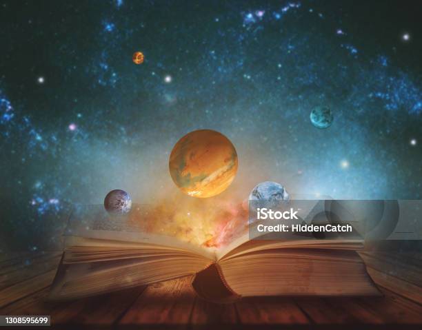 Book Of The Universe Opened Magic Book With Planets And Galaxies Elements Of This Image Furnished By Nasa Stock Photo - Download Image Now
