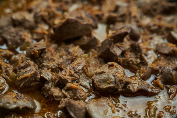 istock fried chicken liver with onions and carrots close-up 1308597618