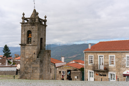 Belmonte, Portugal - October 24, 2020 : Belmonte historic village Sao Tiago church with bell on the tower, in Portugal