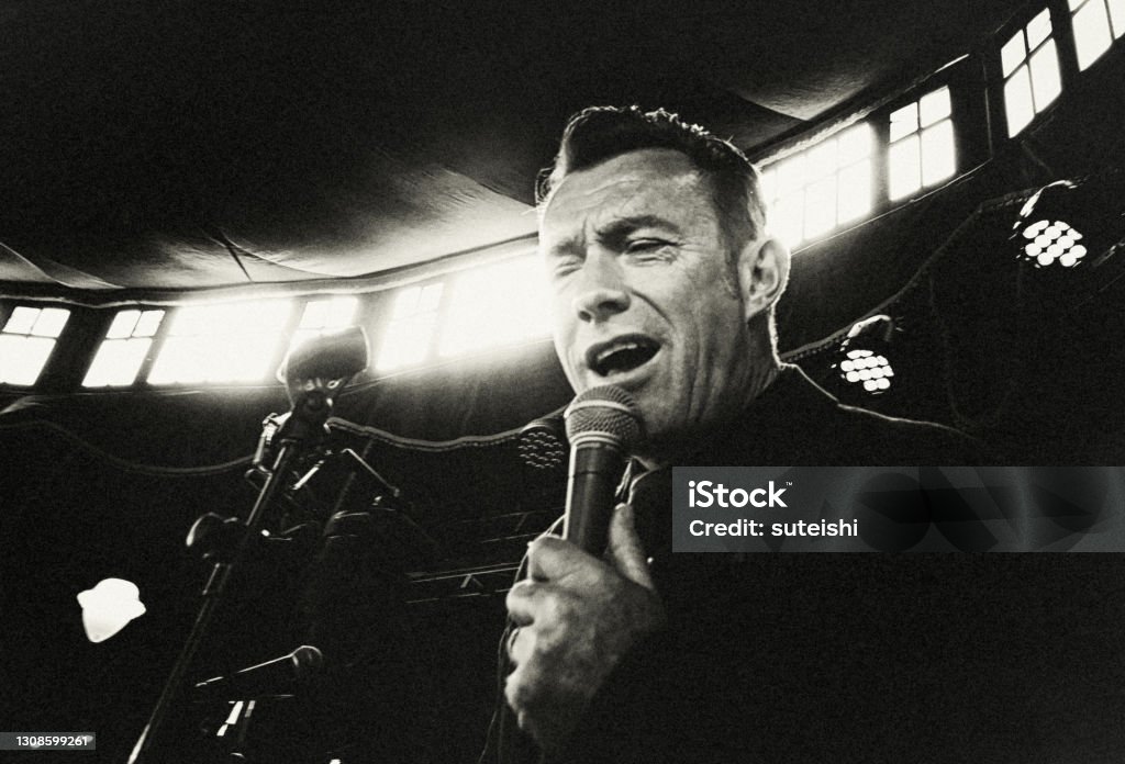 The singer from Brighton. Portrait, characters, singing, vintage, England, dance hall, dance music,  headshot, chanson, Singer Stock Photo