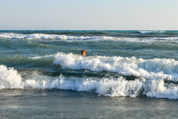 Woman having fun on the beach.