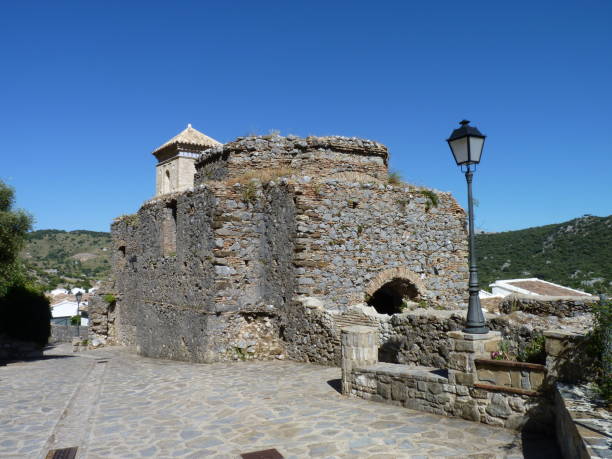 Sierra de Grazalema: the ruins of the church of San Salvador in Villaluenga del Rosario The church was destroyed by Napoleonic troops. Photo from a hike across the stunning Sierra de Grazalema, near Ronda grazalema stock pictures, royalty-free photos & images