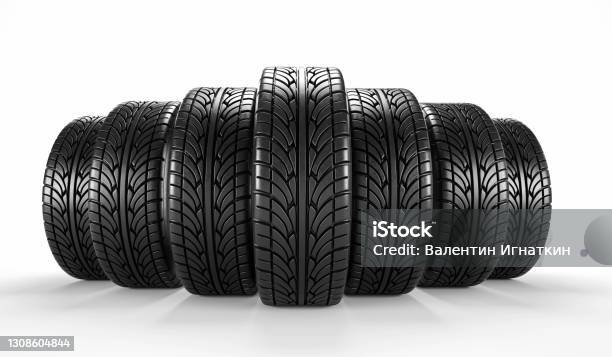 Seven Car Tire On White Background Poster Or Cover Design 3d Rendering Illustration Stock Photo - Download Image Now