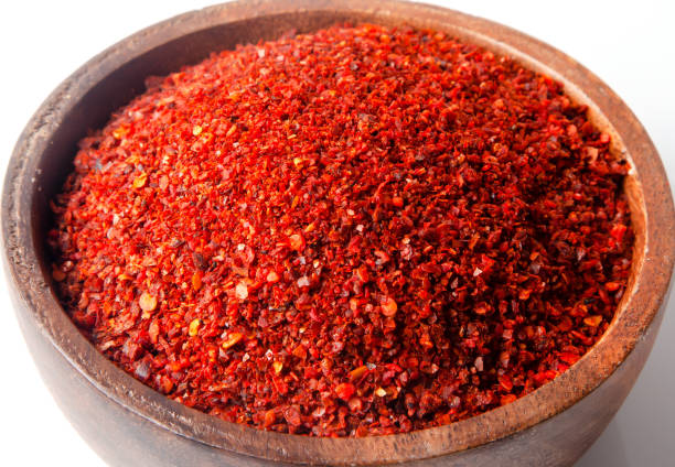 istock Close-up crushed chili peppers in bowl 1308605750