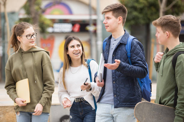 istock Teenage students talking outside after lessons 1308608972