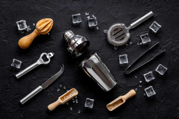 istock Barman equipment tools and cocktail ingredietns, top view 1308610477