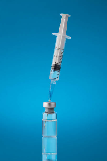 istock Medical vial and syringe 1308610529