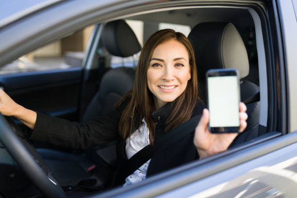 istock Portrait of a beautiful driver working for a ride sharing app 1308612699