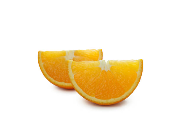 istock Ripe orange slices isolated on white background 1308617349