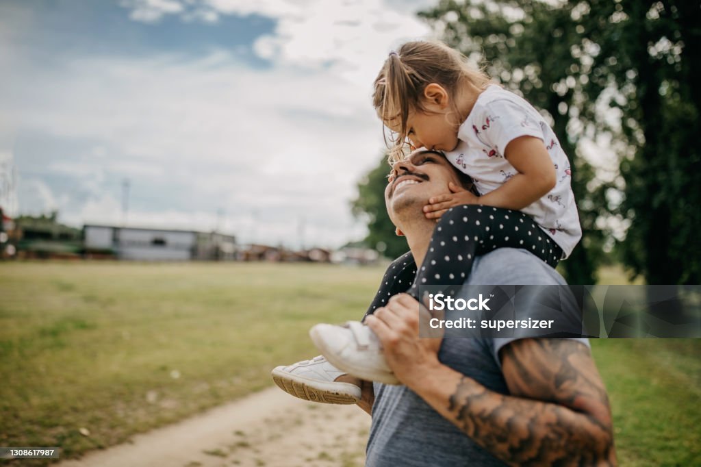 Father and daughter spend quality time together Family Stock Photo