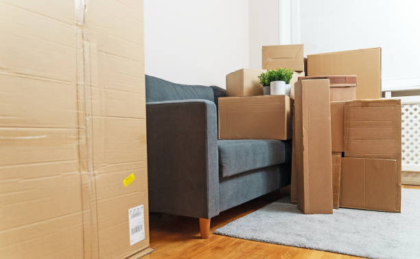 istock Cardboard boxes in room. Real estate and moving concept. 1308618054