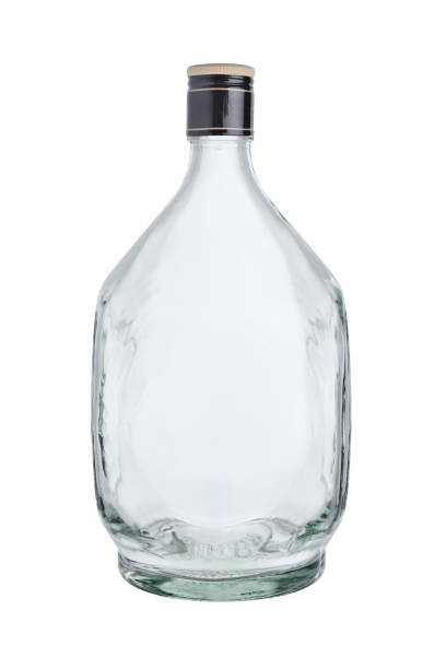 istock Empty glass bottle, sealed with a metal stopper. Isolated on a white background. 1308620804
