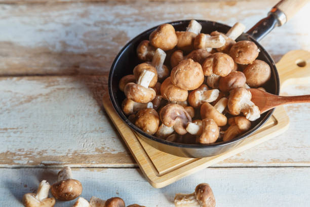 istock Fresh shiitake mushrooms in a pan for cooking 1308621143