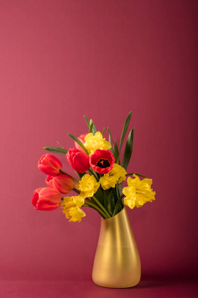 bouquet of flowers (tulips and daffodils) in a vase - daffodil flower yellow vase imagens e fotografias de stock