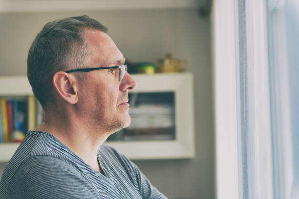 istock Single man suffers from loneliness 1308622636
