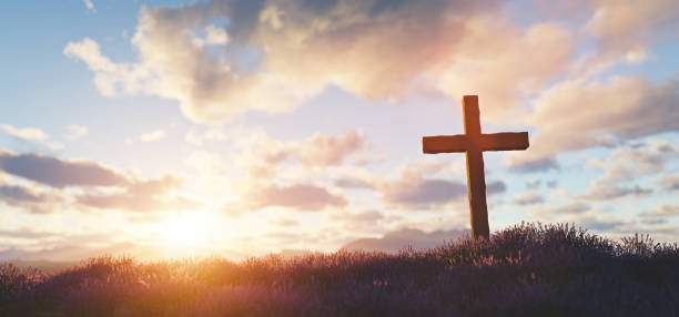 istock Cross at sunset religion and faith 1308622971