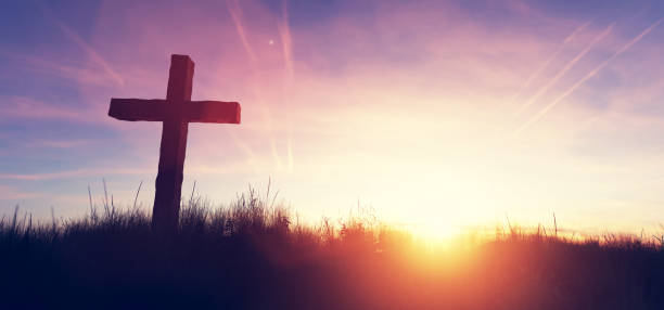 istock Cross at sunset religion and faith 1308622991