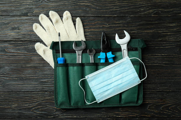 istock Concept of Labor Day with construction tools on wooden background 1308626117