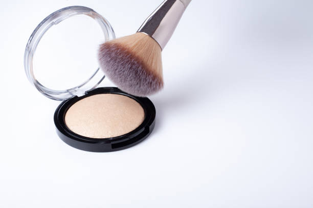 istock Professional cosmetic make-up brush and highlighter. Powder for makeup. 1308626683