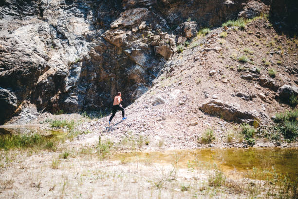 istock Muscular shirtless man running 1308627747