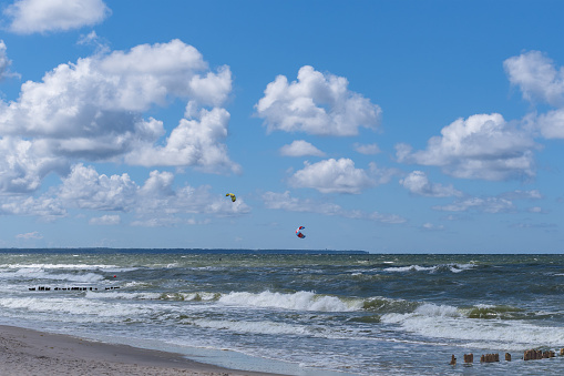 Seascape. Paragliding over the waves of the choppy Baltic Sea on a windy summer day.