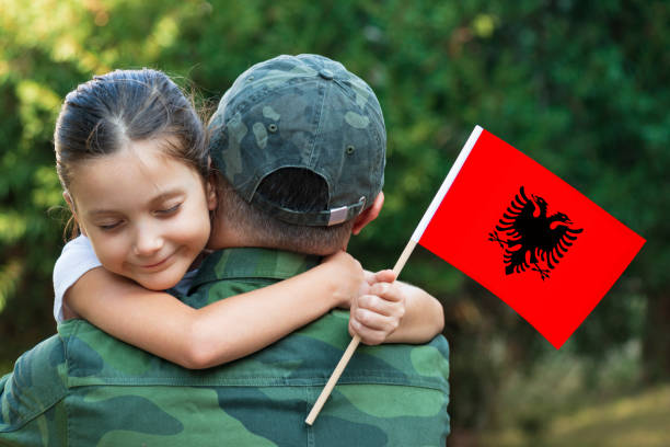 istock Albanian Soldier And His Daughter 1308631238
