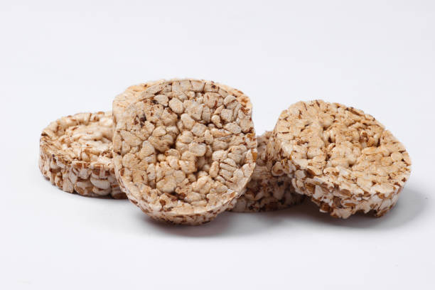 istock Diet Whole grain crispbreads on white background 1308633485