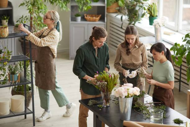 istock Diverse Group of People in Florists Workshop 1308635343
