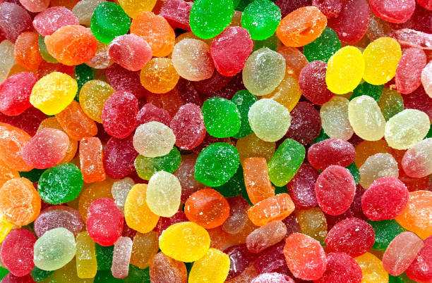 istock Colorful round jelly candies pattern background, marmalade backdrop 1308636357