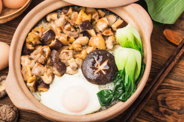istock Cantonese style rice with chicken and mushroom 1308637136
