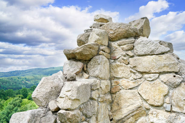 This is a wall made of natural stone built and grouted